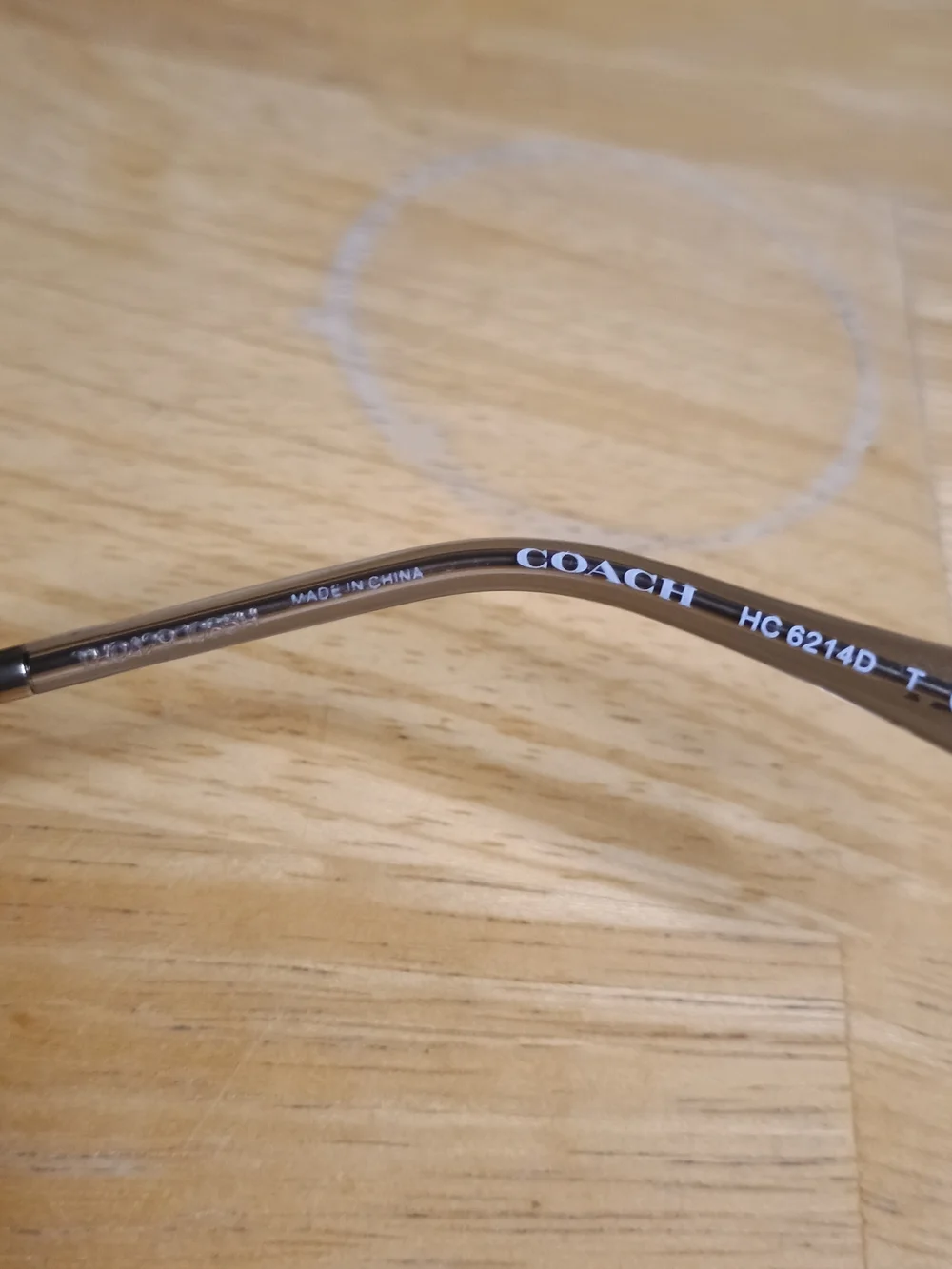 Coach transparent round